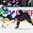 MINSK, BELARUS - MAY 16: Kazakhstan's Konstantin Romanov #85 skate with the puck while USA's Matt Donovan #46 defends during preliminary round action at the 2014 IIHF Ice Hockey World Championship. (Photo by Andre Ringuette/HHOF-IIHF Images)

